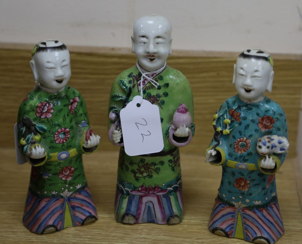 A near pair of Chinese polychrome-decorated figural incense burners and another similar incense burner, Jiaqing period (1796-1820)